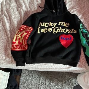 kanye west hoodie size large in great condition, barely worn fits as a medium